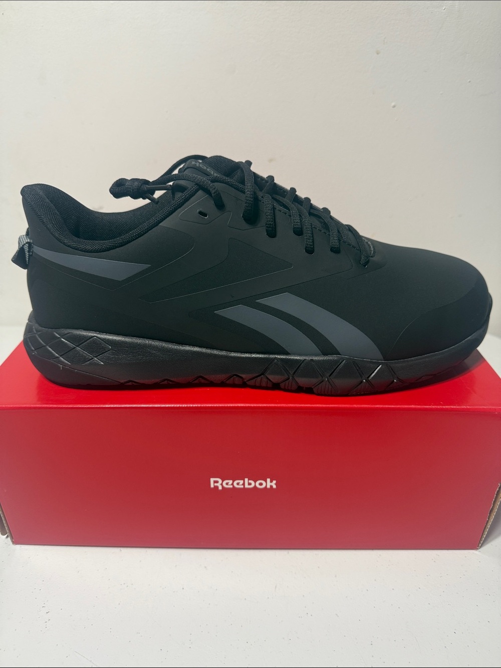 Reebok Men's Black Athletic Sneaker with Subtle Gray Accents